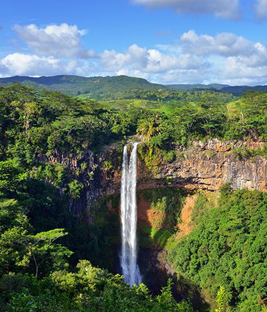 Scenic Chamarel falls in jungle of Mauritius island by Oleg Znamenskiy | World Travel Magazine Scenic Chamarel falls in jungle of Mauritius island by Oleg Znamenskiy
