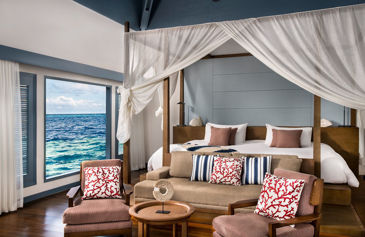 Overwater villa bedroom | World Travel Magazine Overwater villa bedroom