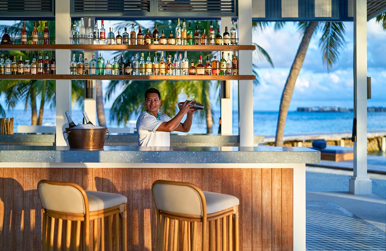 Barman at Long Bar | World Travel Magazine Barman at Long Bar