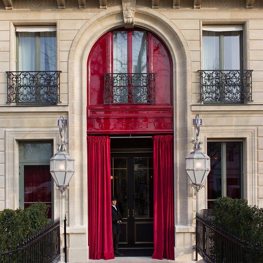 The red-lacquered door of La Réserve | World Travel Magazine The red-lacquered door of La Réserve