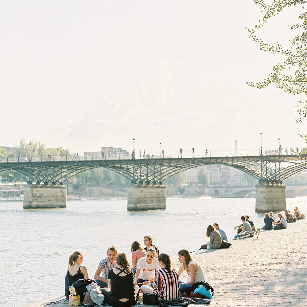 The promenades along the Seine are a popular hangout spot, photo by Analui | World Travel Magazine The promenades along the Seine are a popular hangout spot, photo by Analui