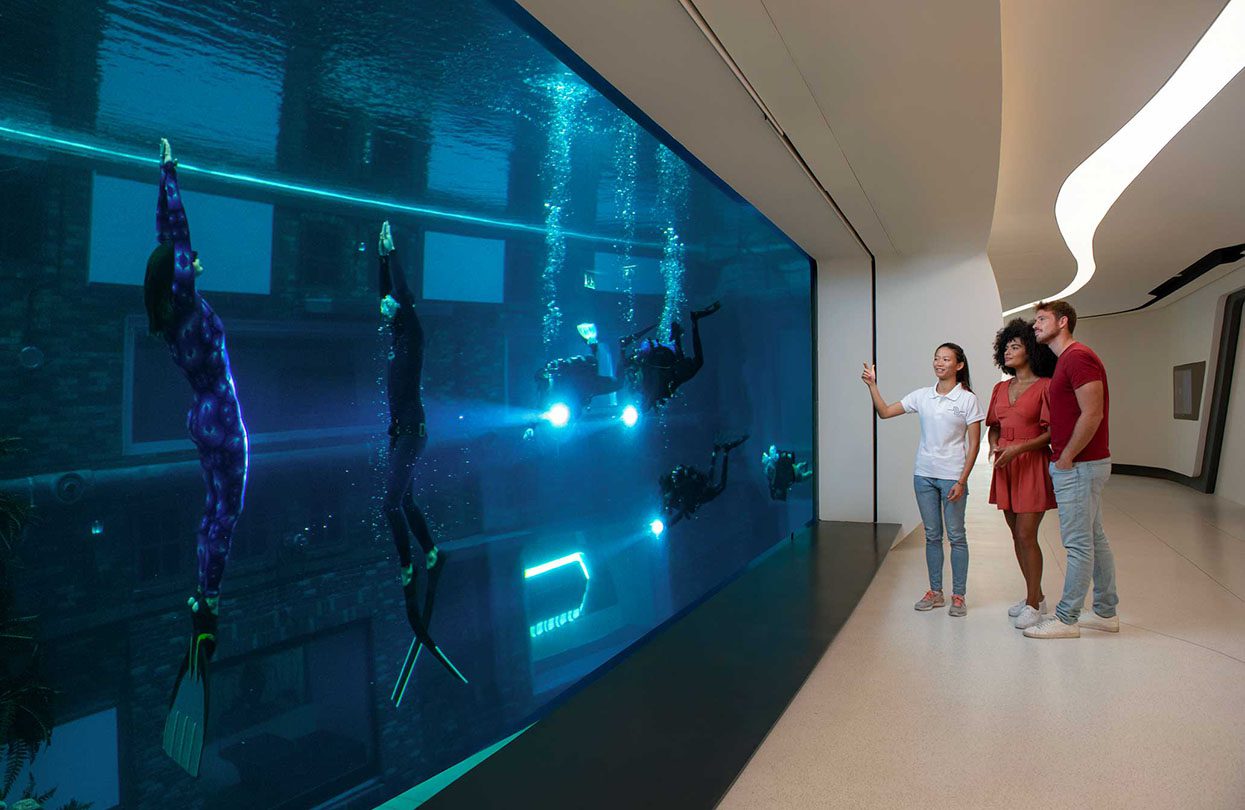 Taking a peek from a hallway window at Deep Dive Dubai | World Travel Magazine Taking a peek from a hallway window at Deep Dive Dubai
