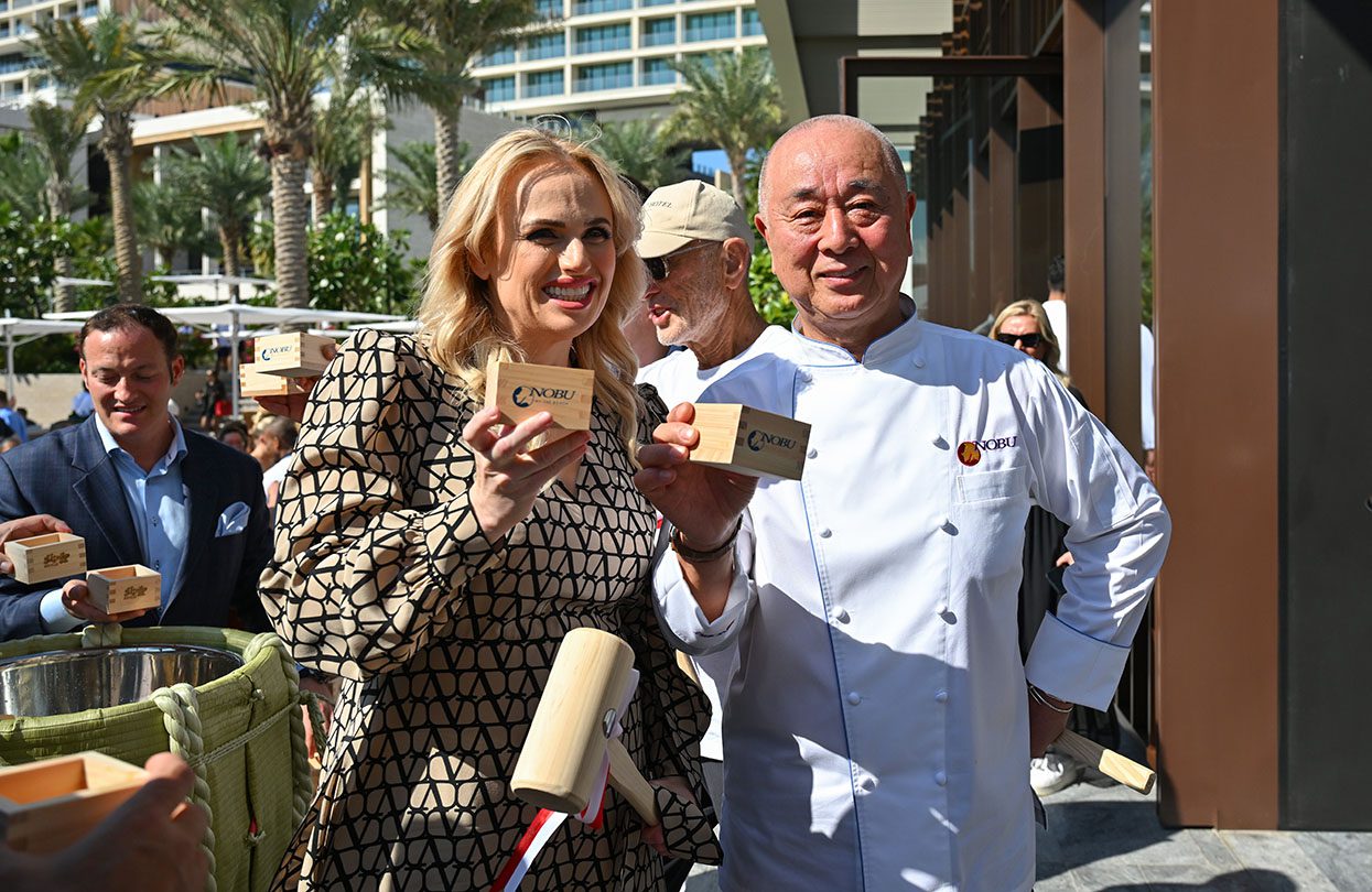 Rebel Wilson and Nobu Matsuhisa at Nobu by the Beach, Atlantis, The Royal, photo by Cedric Ribeiro, Getty Images for Atlantis The Royal | World Travel Magazine Rebel Wilson and Nobu Matsuhisa at Nobu by the Beach, Atlantis, The Royal, photo by Cedric Ribeiro, Getty Images for Atlantis The Royal