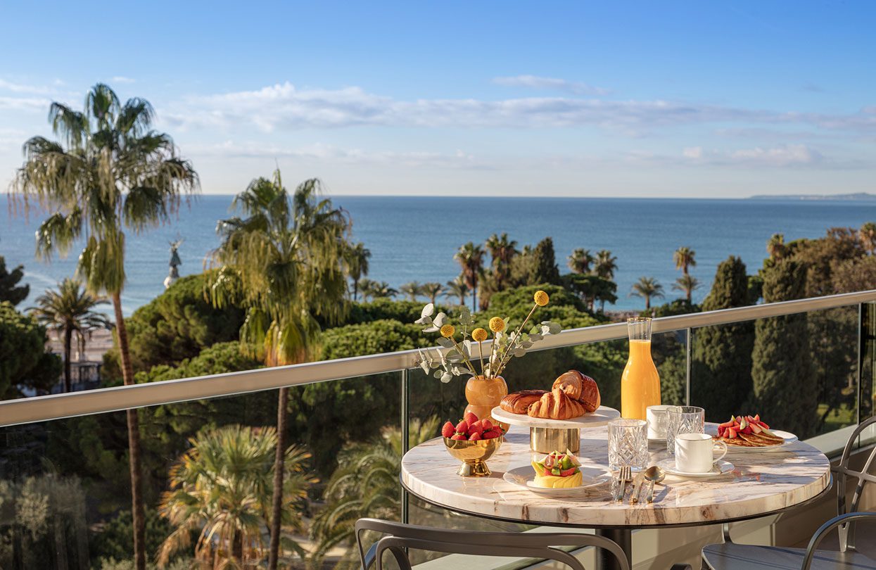 Anantara Plaza Nice Hotel’s Presidential Suite Balcony with Breakfast overlooking the gardens and beach | World Travel Magazine Anantara Plaza Nice Hotel’s Presidential Suite Balcony with Breakfast overlooking the gardens and beach