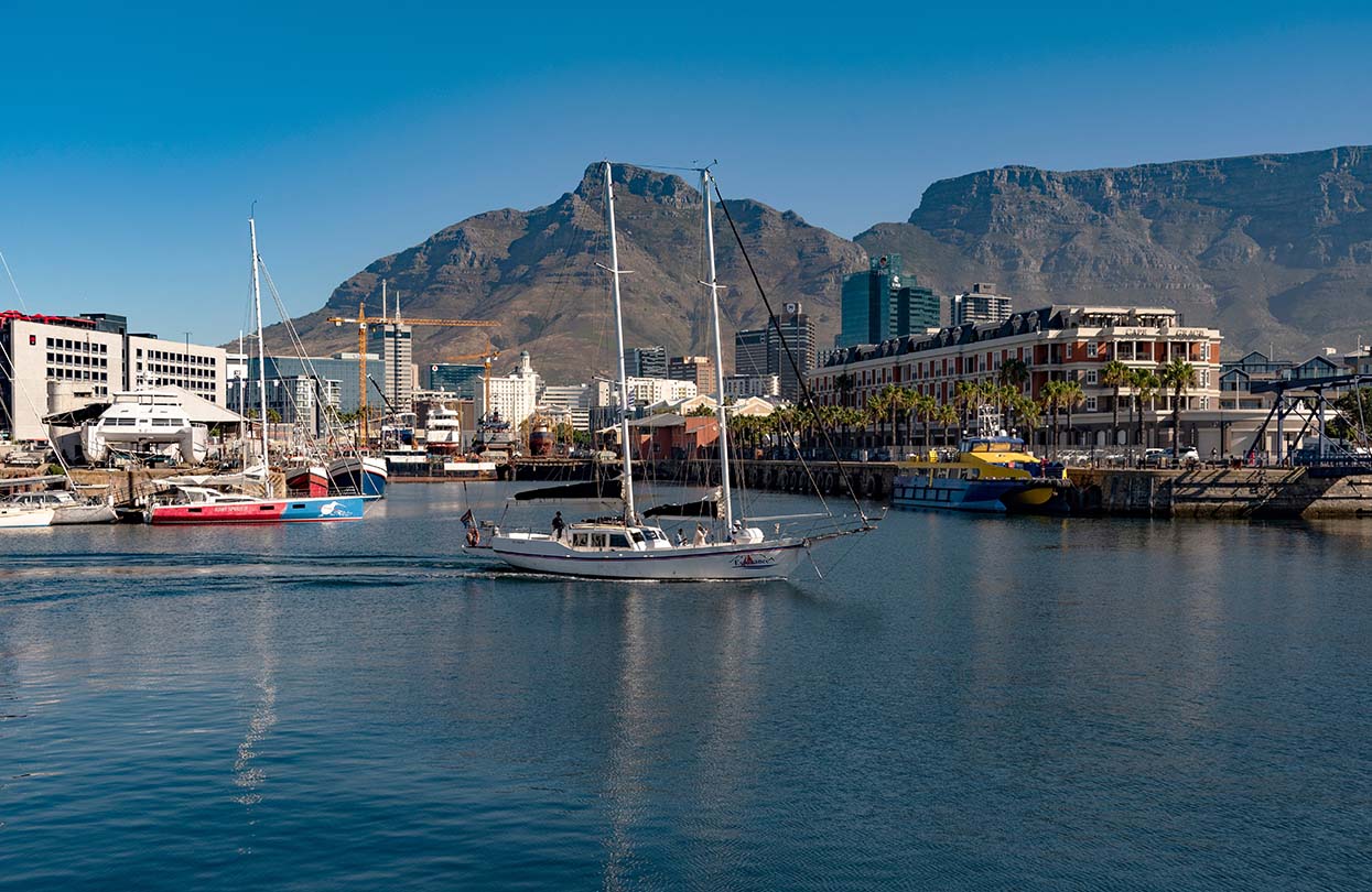 Tourist trip yacht crossing Cape Town Harbour, image by Peter Titmuss shutterstock | World Travel Magazine Tourist trip yacht crossing Cape Town Harbour, image by Peter Titmuss shutterstock