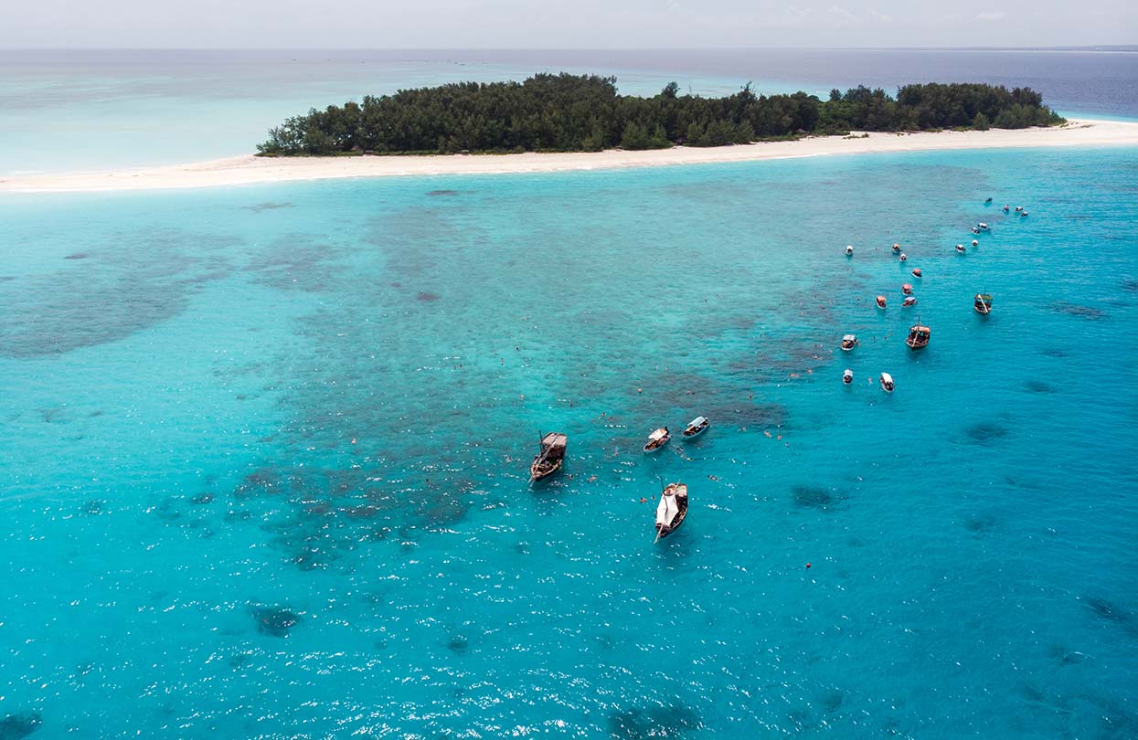 Mnemba Atoll in Zanzibar, image by Gideon Ikigai, shutterstock | World Travel Magazine Mnemba Atoll in Zanzibar, image by Gideon Ikigai, shutterstock