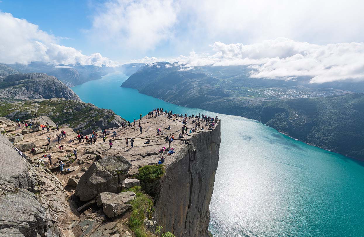 Cliff Preikestolen in fjord Lysefjord, Image by Pe3k, shutterstock | World Travel Magazine Cliff Preikestolen in fjord Lysefjord, Image by Pe3k, shutterstock