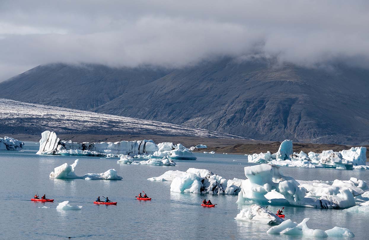 Kayaking in Jökulsárlón Glacier Lagoon, Image by Austin Hawley, Shutterstock | World Travel Magazine Kayaking in Jökulsárlón Glacier Lagoon, Image by Austin Hawley, Shutterstock