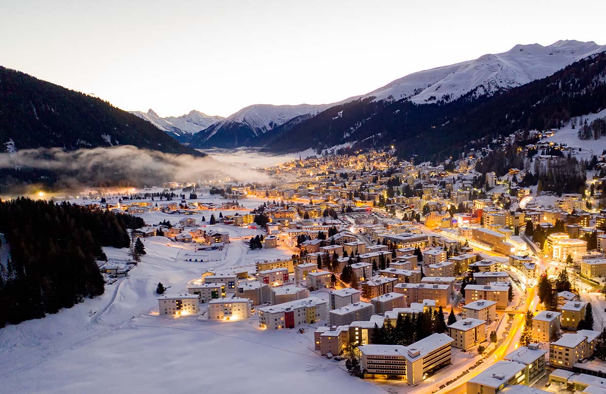 The city of Davos illuminated by the evening lights, Image Copyright Marcel Giger | World Travel Magazine The city of Davos illuminated by the evening lights, Image Copyright Marcel Giger