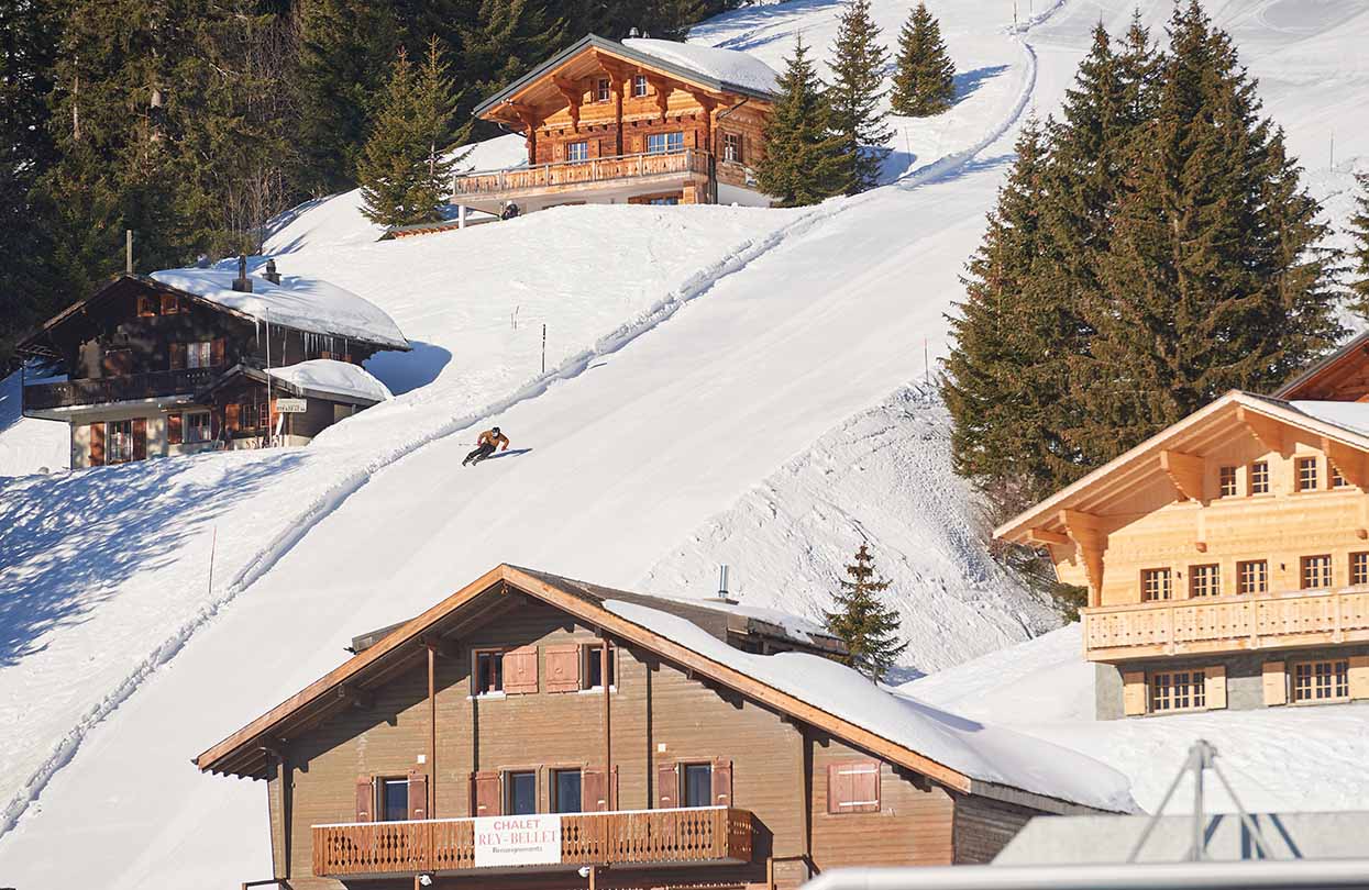 The ski trails here glide past picturesque chalets, Image Copyright Ruedi Flück, Switzerland Tourism | World Travel Magazine The ski trails here glide past picturesque chalets, Image Copyright Ruedi Flück, Switzerland Tourism